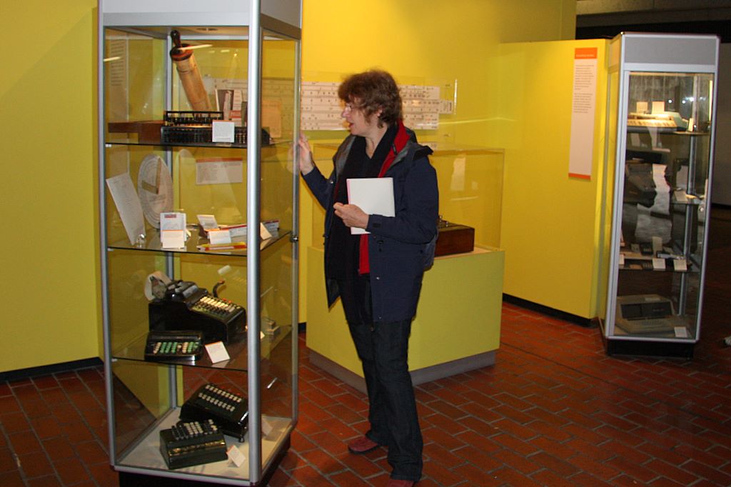 Monash Museum of Computing History: Dr Judy Sheard (Director) with calculator display